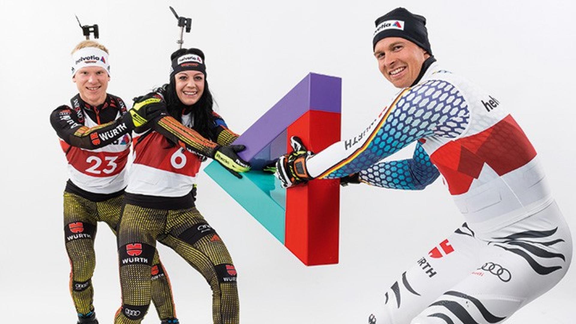 Drei Wintersportler mit dem Helvetia Logo